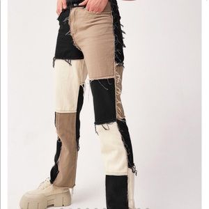 Cute black patchwork boyfriend jeans. Size S